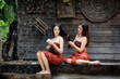 © EmmaStock - THAILAND Beautiful two women is a friend together in Thai traditional dress