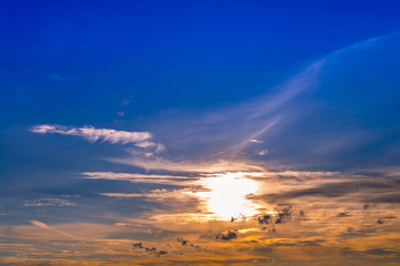 Wall Mural - sunset/sunrise sky with light beam pass clouds and sky background