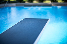 Closeup View Of Diving Board In Swimming Pool