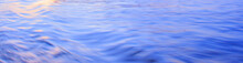 Light Reflection On Blue River Wave Ripples Surface. Abstract, Tranquility,romance.