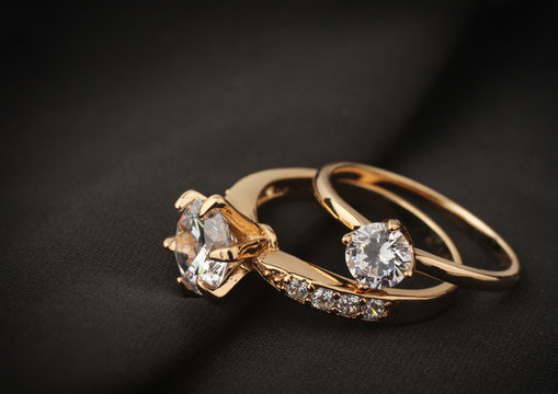jewelry rings with diamond on black cloth, soft focus