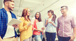 © Syda Productions - creative team on coffee break talking at office