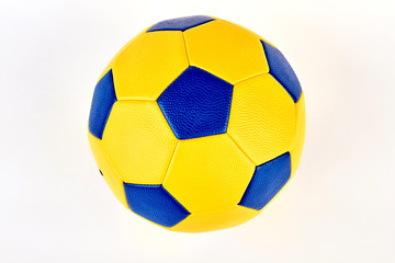 Soccer ball on white background. Circular shaped equipment for football.