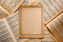 Vintage Sheet Of Paper And Music Notes