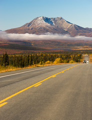 Highway Leads On Wilderness Road Alaska Mountain Landscape