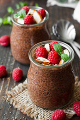 Wall Mural - Chocolate pudding with chia seeds and raspberries