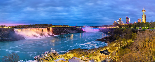 Wall Mural - Panoramic view of Niagara Falls in the evening from Canada
