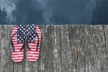 Flag flip flops on dock