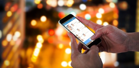 Poster - Composite 3d image of close-up of man holding smart phone