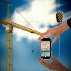 Poster - Composite 3d image of hands holding smartphone