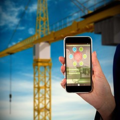 Poster - mid section of businesswoman holding smartphone