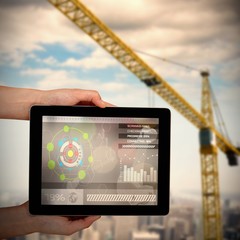 Poster - Composite 3d image of close-up of hands holding digital tablet