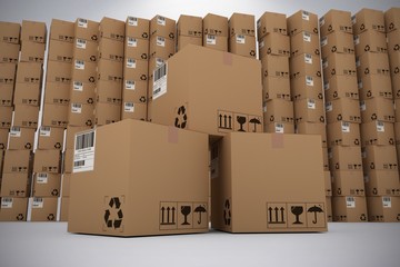 Canvas Print - Composite image of pile of brown cardboard boxes