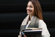 © NDABCREATIVITY - Attractive and beautiful businesswoman standing at office