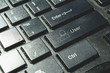 © madrolly - User account icon on keyboard. Cyber security concept