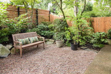 Comfortable urban backyard with bench