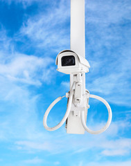 Wall Mural - cctv camera with blue sky