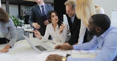 Poster - group of business people cheering for good results clappping hands during meeting in office, success