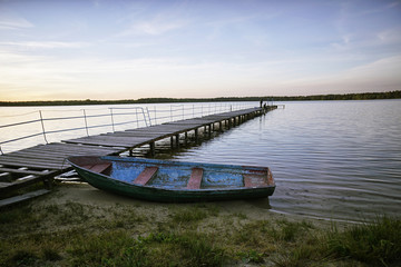 Naklejka na meble Landscape with a lake and boats.