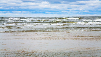 Poster - rainy clouds over beach of Baltic Sea in autumn