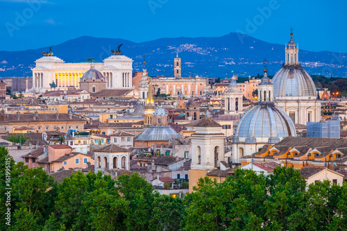 Fototapeta Twilight on Tiber river with cityscape of Rome,Italy Skyline of Rome, with its best architecture and landmarks Rome panorama is a top romantic choice at sunset