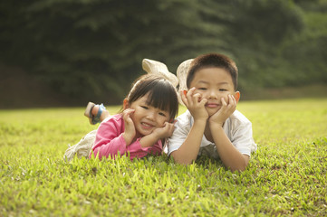 boy and girl posing to camera