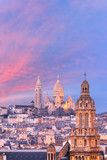 Fototapeta  - Aerial view of Sacre-Coeur Basilica or Basilica of the Sacred Heart of Jesus at the butte Montmartre and Saint Trinity church at nice sunset, Paris, France