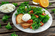 © grinchh - Breakfast Green Kale with poached eggs, feta cheese, tomatoes and toast. healthy food