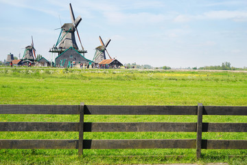 Canvas Print - Beautiful landscape with windmills and lawn