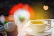 © worranam2w - Abstract soft blurred and soft focus a cup of coffee, microphone of the stage concert light and sound with the bokeh, beam light, shadow, and lens flare effect tone background.