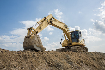 excavator blue sky heavy machine construction site