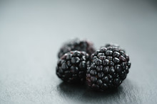 Ripe Organic Blackberries On Slate Background