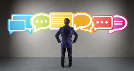 Wall Mural - businessman using social network interface on a wall 3d rendering