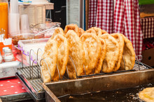 Traditional Hungarian Fried Bread Langos Sold At A Street Vendor