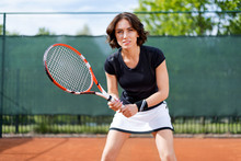 Beautiful Young Girl On The Open Tennis Court