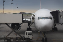 Aircraft Standing At Gate And Being Loaded With Luggage