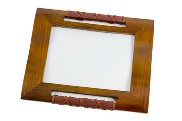 Wooden picture frame isolated on white background.