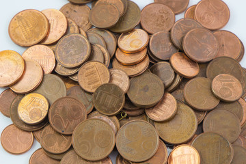 Pile of euro coins money isolated white background. / Many of small euro gold coins for design and background.