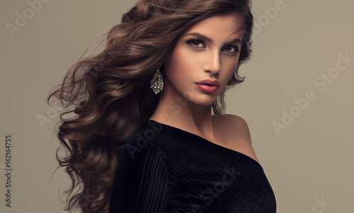Brunette Girl With Long And Shiny Wavy Hair Beautiful