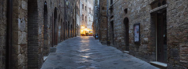 last night lights on the street in tuscany city in italy