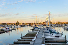 Many Boats On Marina During Sunrise In Oxnard, California