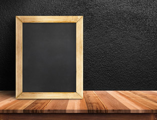 Aufkleber - Blank blackboard on wood plnak table at black concrete wall,Template mock up for adding your design and leave space beside frame for adding more text