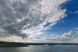 © Ivan - View of the lake from heights with a dramatic light and clouds in the sky