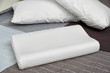 © Africa Studio - Orthopedic pillow on bed. Physiotherapy concept