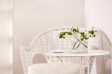 Sticker - Vase with beautiful flowers on table at home