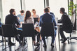 © alfa27 - Businesspeople discussing together in conference room during meeting at office