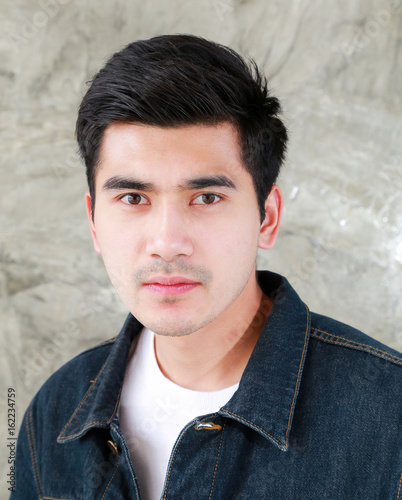 Closeup Asian Man Casual Outfits Standing In Jeans And Black Denim