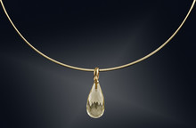 Golden Necklace With Gemstone Isolated On Black