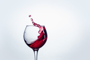 The one wine glass against white