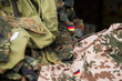 © irontrybex - Close up on German flag on military uniform